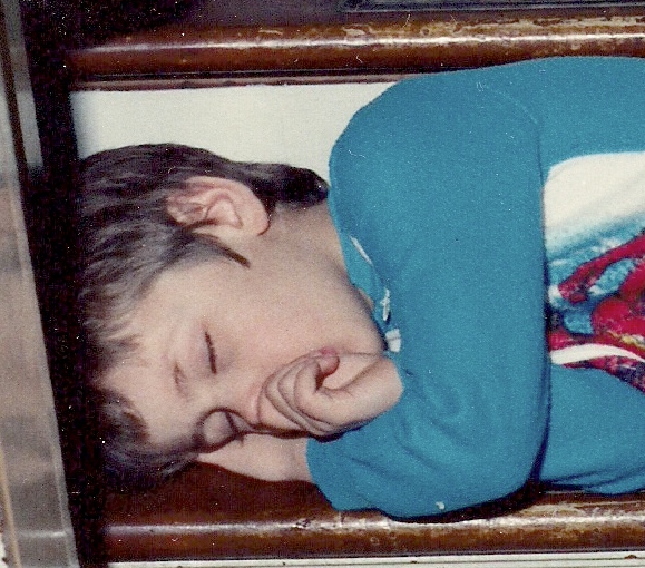 Richard sleeping on the stairs